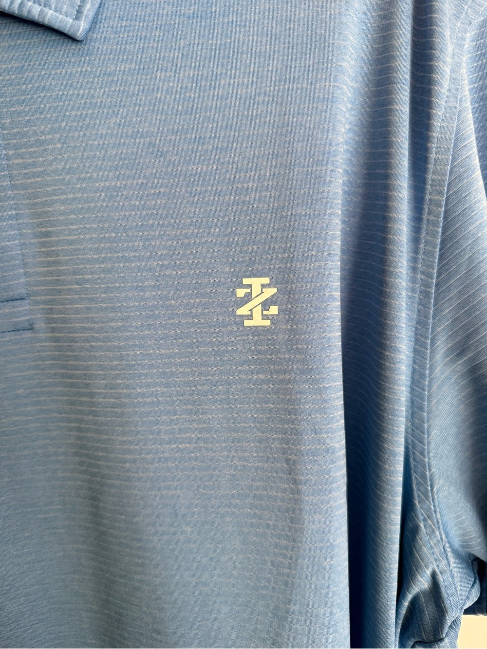 Izod Men’s Polo Shirt in Light Blue with Embroidered Logo - Picture 5 of 5